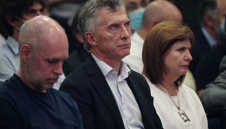 Macri con periodista FMI